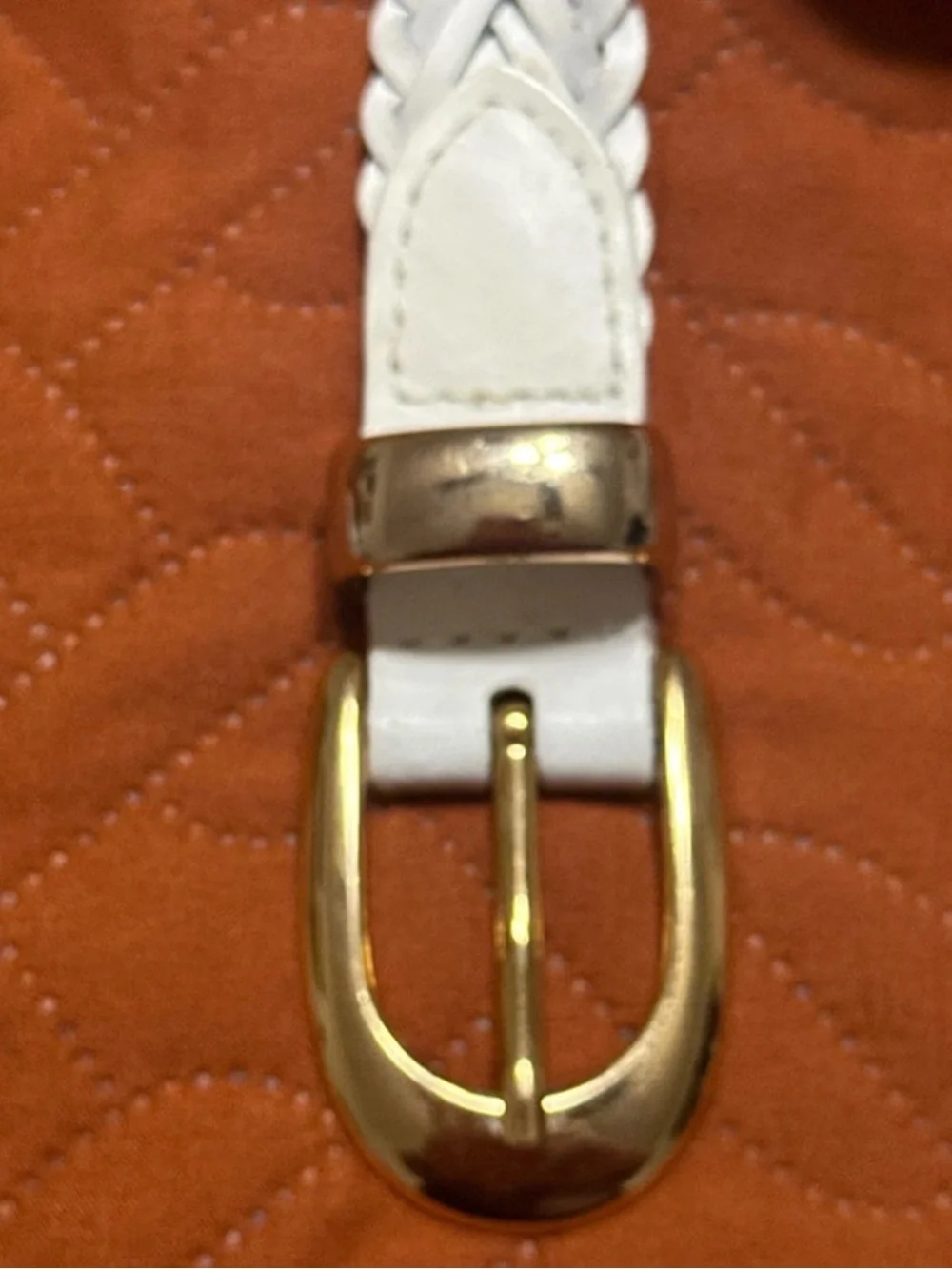 White braided leather belt with a gold-tone buckle and tip. Size US M/L
